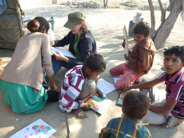 Anne showing the salt pan community some drawing techniques